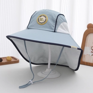 Detail of blue sun hat with large brim, neck protector flap and mesh breathability