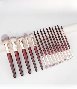 Detailed close-up of 15-piece professional makeup brush set with dark brown handles