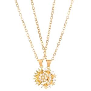 Detailed view of magnetic sun and moon necklaces with gold plating and cubic zirconia