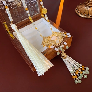 Vintage Chinese style gold peace lock necklace with white pearls and long silk tassels