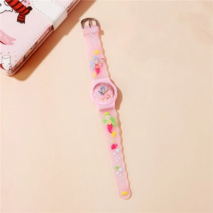 Detailed view of pink mermaid cartoon watch with embossed silicone strap for kids
