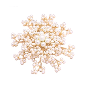 Elegant gold snowflake brooch with imitation pearls for winter coats and apparel