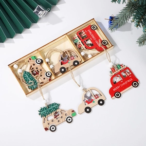 Detailed view of Christmas wooden truck ornaments in a storage box with festive decor