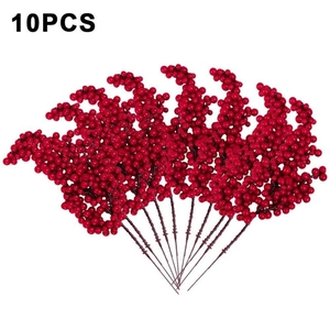 Flat lay of 10 pieces artificial red berries stems for home and New Year decoration