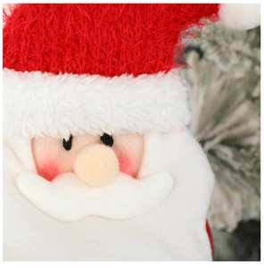 Close-up of knitted Santa Claus curtain tieback with white faux fur and holiday details