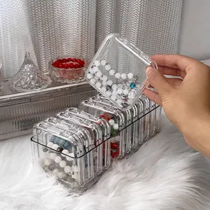 Organizador de acrílico transparente para pulseras con compartimentos individuales abatibles