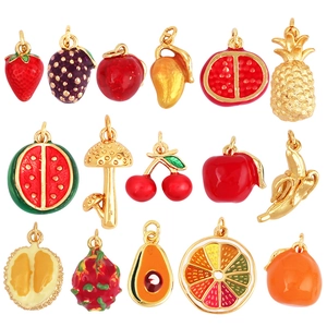 Colorful fruit and plant jewelry charms in gold-tone metal with vibrant enamel finish