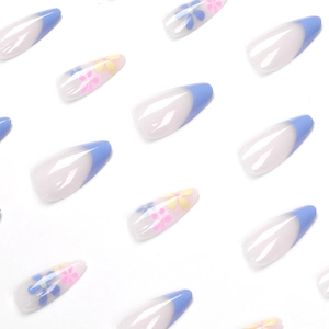 French blue almond press-on nails with minimalist flower patterns for a summer look