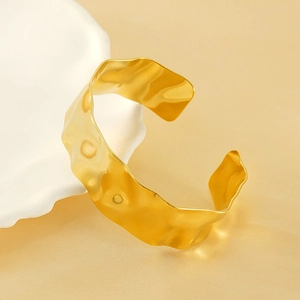 Adjustable 18K gold-plated titanium steel cuff bracelet with hammered wavy texture