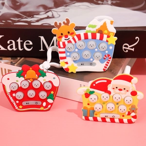 Set of 3 Christmas themed quick push fidget toys in red, white and yellow handheld designs