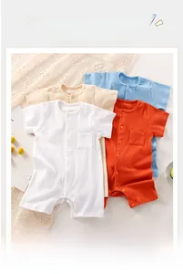 Flat lay of ribbed cotton baby bodysuits in white, beige, light blue and orange
