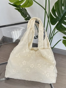 Elegant off-white floral embroidery tote bag with detailed lace texture for women