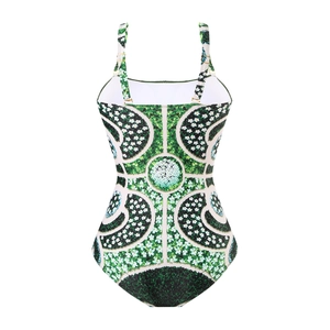 Détail du dos à imprimé géométrique vert avec bretelles réglables sur ce maillot de bain une pièce