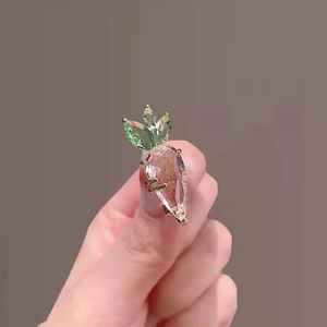 Exquisite pink crystal carrot brooch with green leaves and gold metal plating