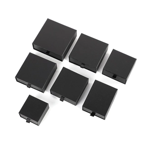 Matte black drawer-style jewelry gift boxes with ribbon pulls in various sizes