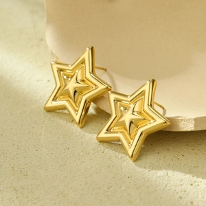 Minimalist double-layered gold star stud earrings in high-polished stainless steel