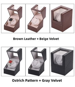 Detail view of single watch winder in brown leather and black ostrich pattern finishes