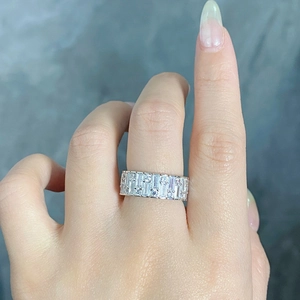 Detail of silver S925 sterling silver couple ring with baguette and round cut cubic zirconia