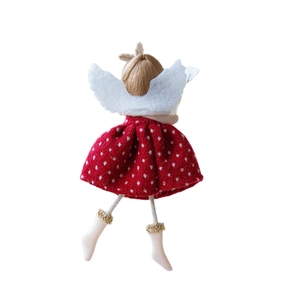 Christmas angel doll with red polka dot dress and white felt wings for holiday decoration