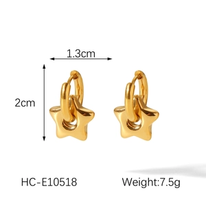 Detailed view of gold star hoop earrings with dimensions 1.3cm by 2.0cm and weight info