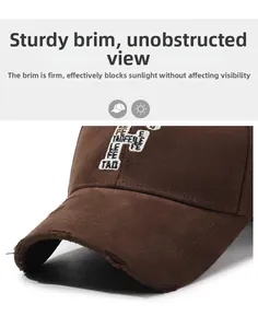 Detail of durable brown canvas baseball cap showing frayed brim and embroidered F logo