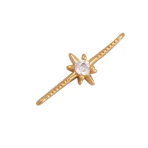 Macro view of 18mm gold plated star jewelry connector with white zircon stone inlay