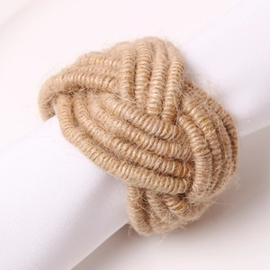 Handwoven hemp rope napkin ring in a knot design for modern minimalist table decor