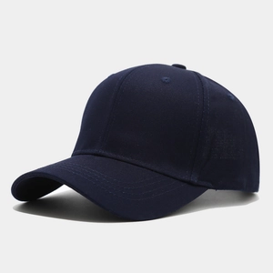 Detail of navy blue six-panel baseball cap with pre-curved brim and high-density twill fabric
