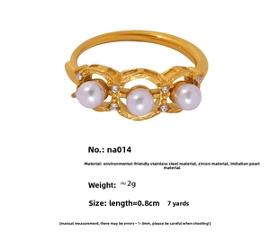 Detail view of gold stainless steel ring with pearls, cubic zirconia, and size measurements