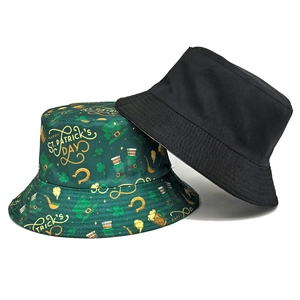 Reversible St. Patrick's Day bucket hat featuring shamrock print and solid black cotton
