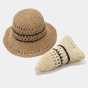 Women's wide brim hollow paper straw hat with black stripes and foldable design