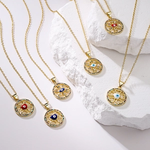 Bohemian 18K gold plated copper evil eye necklaces with colorful zircon on white rock