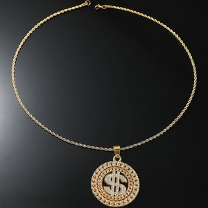 Close-up of hip hop gold necklace with spinning dollar sign pendant and shiny crystals