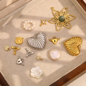 Variety of 18K gold plated heart, star and angel key pendants with pearls and zircons