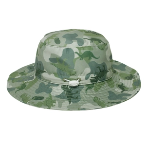 Detail of kids sun hat featuring green dinosaur camo print and adjustable chin strap