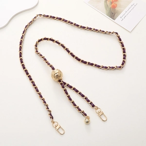 Detail of purple leather woven chain with golden adjustable ball for DIY phone case strap