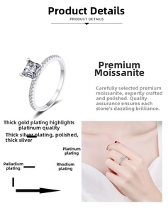 Detailed view of square cut moissanite ring with thick gold plating and side stones