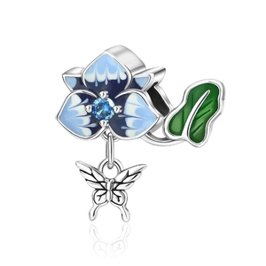 Silver blue orchid charm with enamel petals and dangling butterfly insect pendant