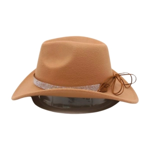 Close-up of brown wool felt cowboy hat with rhinestone band and tassel detail