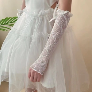 White Lolita lace arm sleeves with hollow mesh texture and elegant ribbon bow details