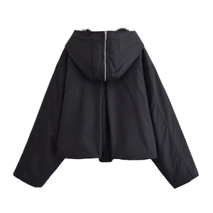 Women's black cropped hooded jacket featuring a faux fur collar and rear metal zipper detail