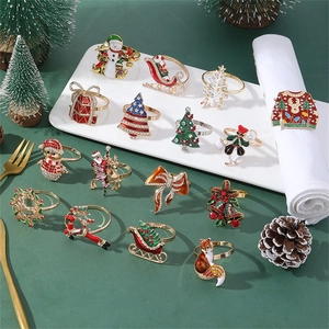 Creative Christmas napkin rings with colorful enamel reindeer and festive tree motifs