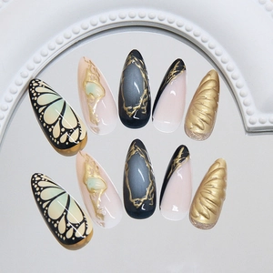 French retro style press on nails with gold butterfly wings and 3D textured carving