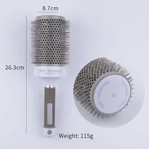 Detail of 65mm ceramic ionic roller brush with grey thermal barrel and ergonomic handle