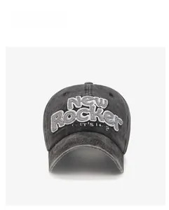 Front view of washed dark grey cotton baseball cap with New Rocker 3D embroidery detail