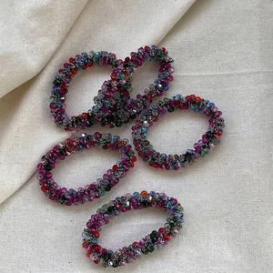 Five-piece set of colorful beaded elastic hair ties and bracelets with faceted crystals