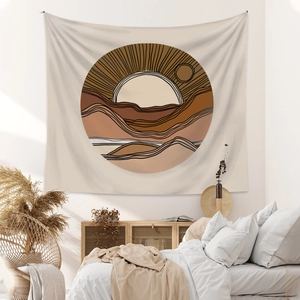 Close-up of bohemian wall tapestry with abstract mountain scenery and smooth fabric texture