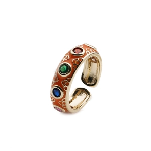Detailed view of orange enamel adjustable evil eye ring with multi-color zircon stones