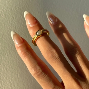 18k gold plated stainless steel ring featuring an oval freshwater pearl inlay