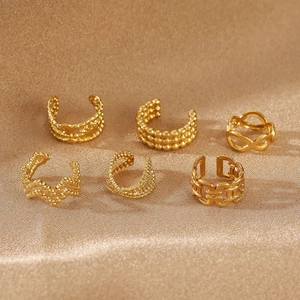 6-piece gold geometric ear cuffs set featuring beads and hollow chain designs on satin